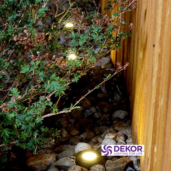 Dekor Puck Lights Installed By Fence